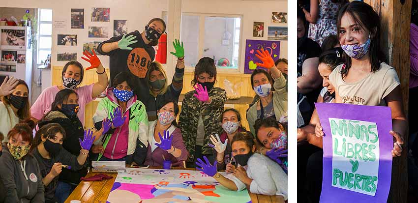 Fotografía de mujeres preparando carteles sobre igualdad de género